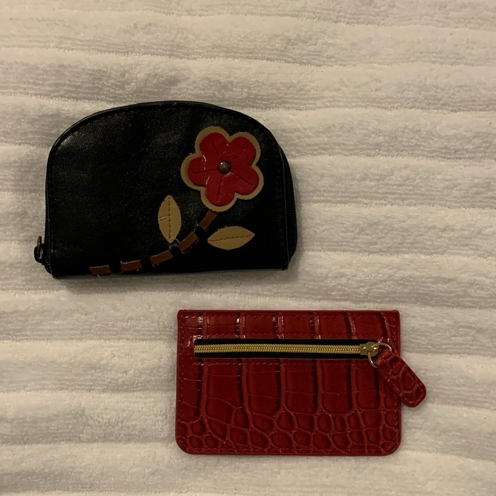Accessories. Black zip around opens to three storage areas/Red one holds 2 cards